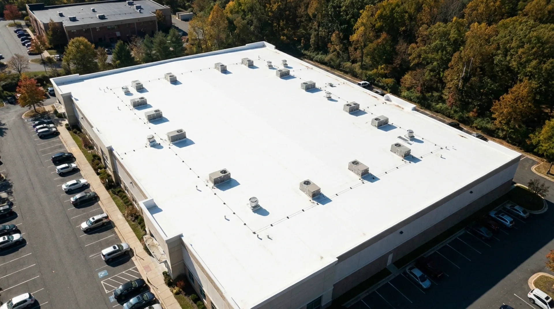 Aerial view of commercial TPO roof with HVAC units in Maryland