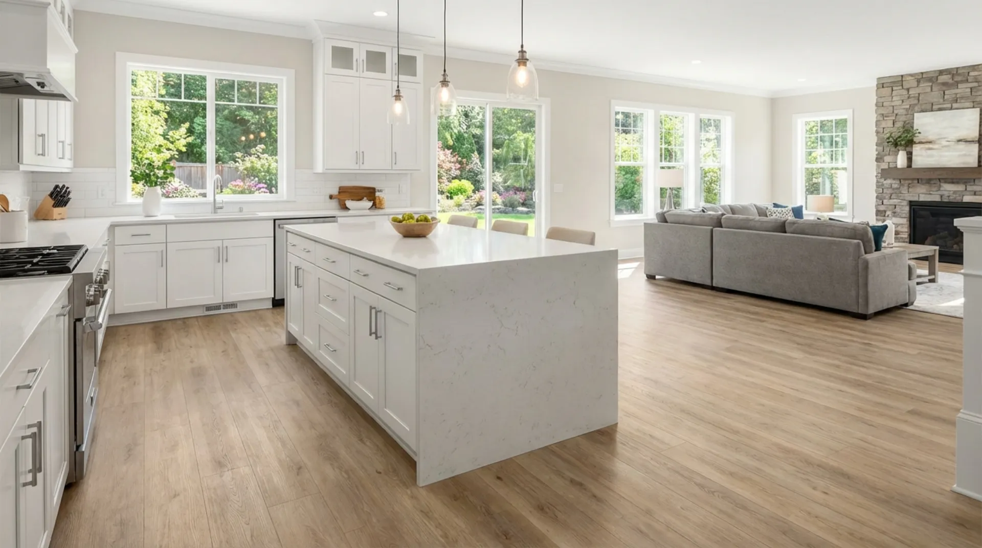 Open concept kitchen and living room with LVP flooring in Maryland home