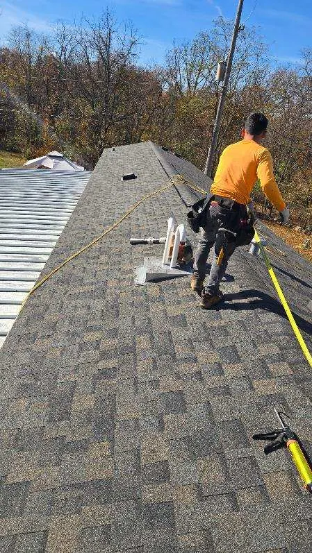Bathroom remodel with marble vanity and frameless glass shower