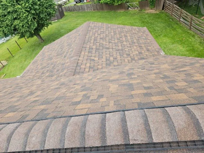 New roof with gutter guard system installed